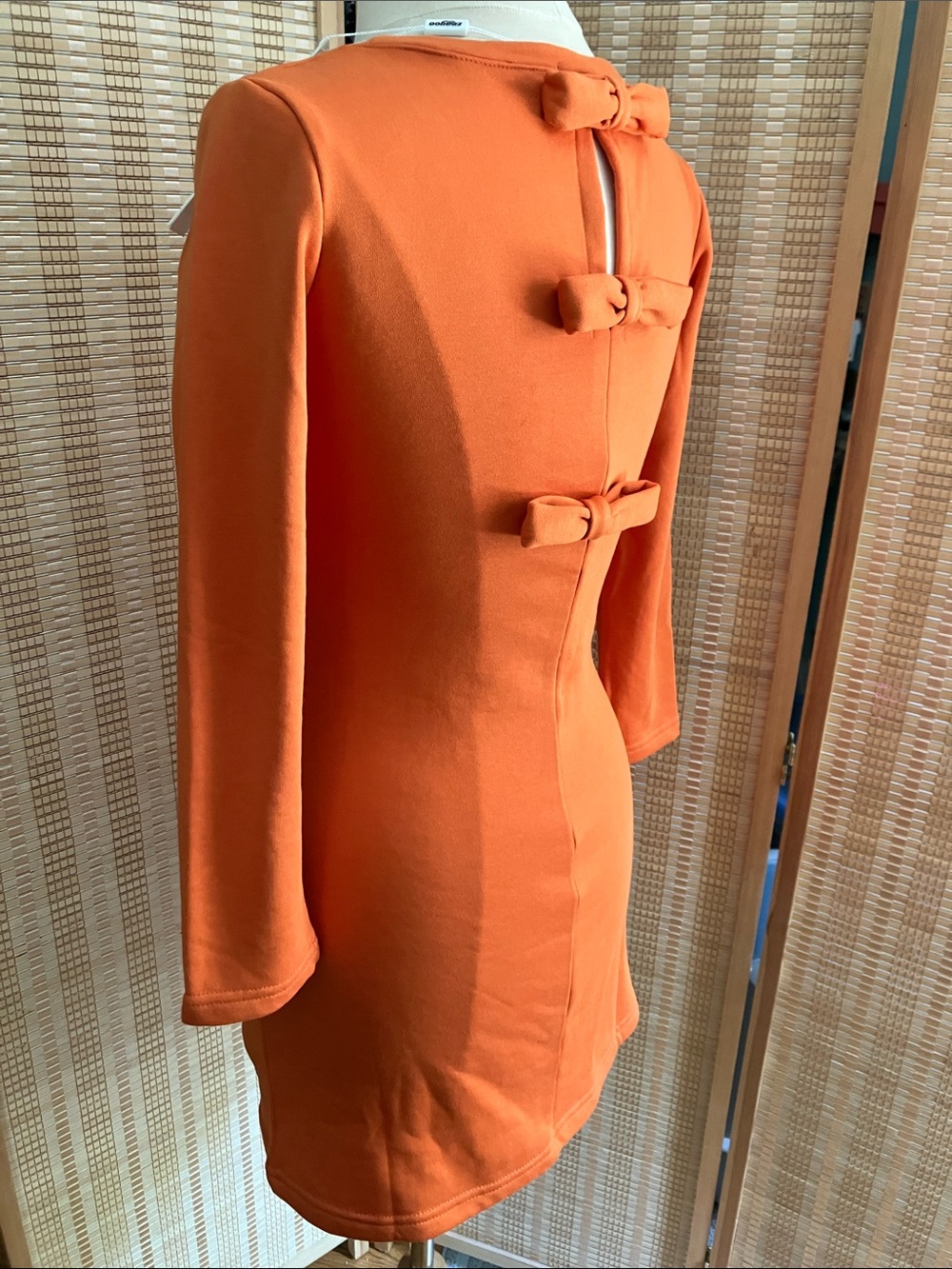 Eye catching Orange Bow-Back Long Sleeve Dress